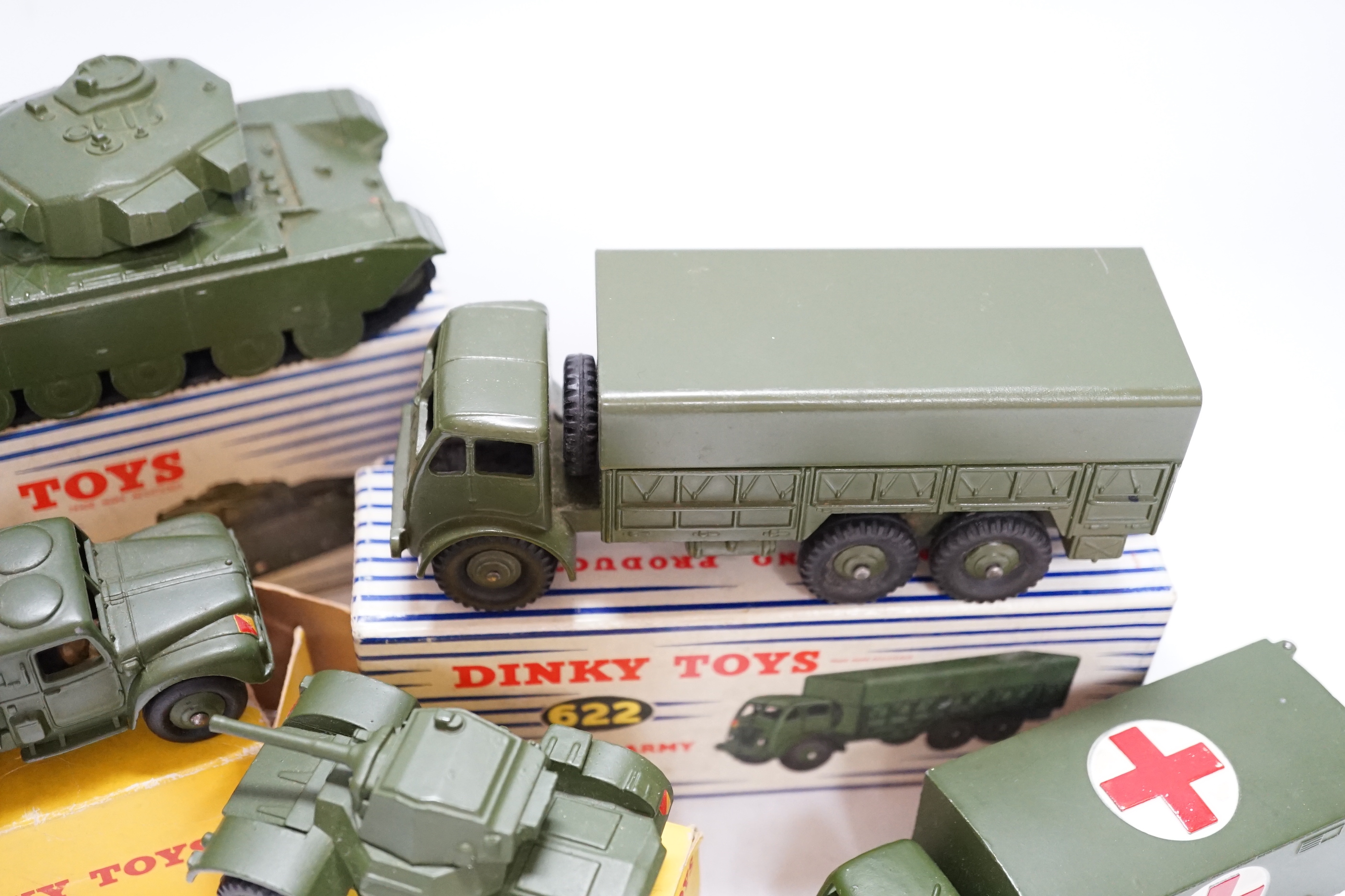 Eleven boxed military Dinky Toys